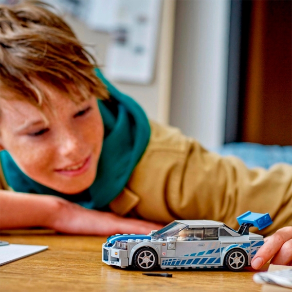 Конструктор LEGO 2 Fast 2 Furious Nissan Skyline GT-R (R34) Разноцветный Количество деталей 319, 9+ photo 8