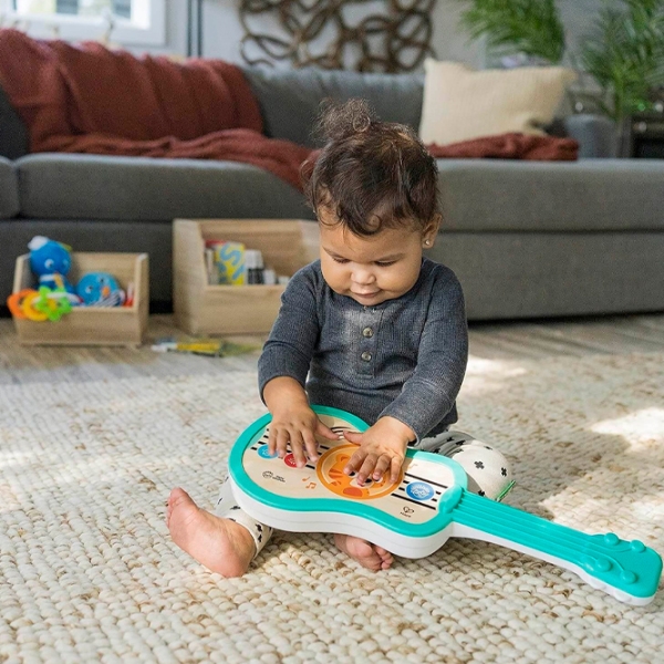 Музыкальная игрушка Baby Einstein Заколдованная укулеле 12609 Синий 0.6+ photo 4