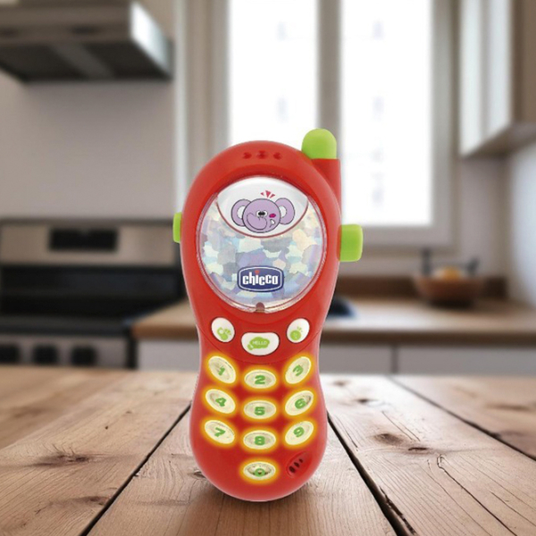Игрушка Chicco Vibrating Photo Phone 66699.00 Разноцветный 0.6+ photo 2